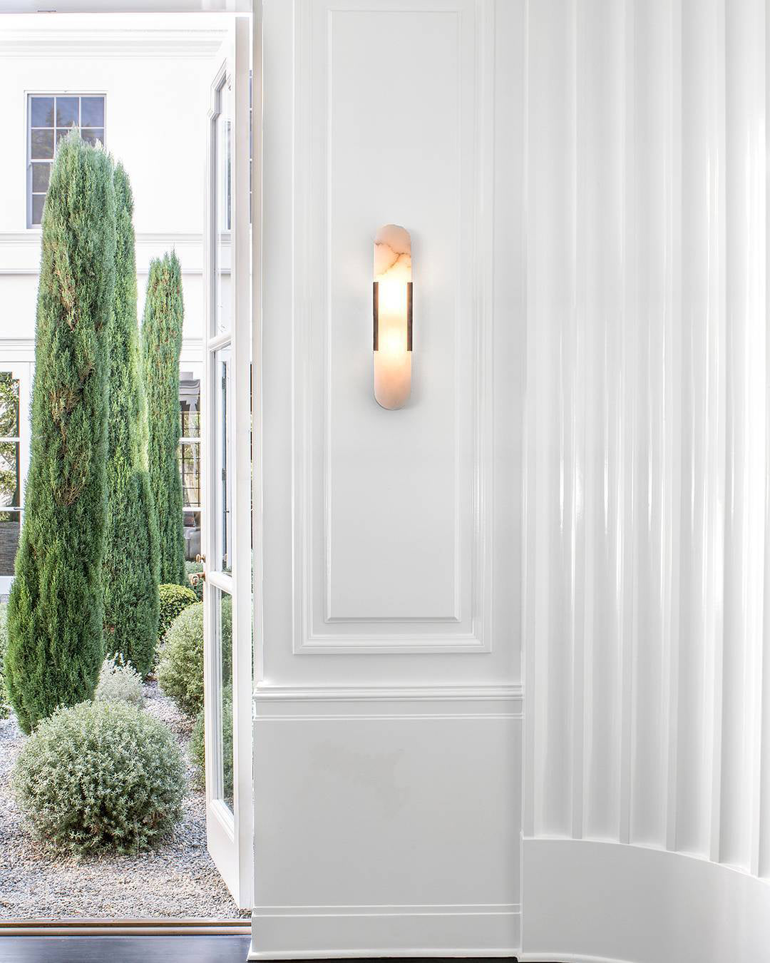 Moran - Applique da parete ovale in marmo con lampada LED regolabile