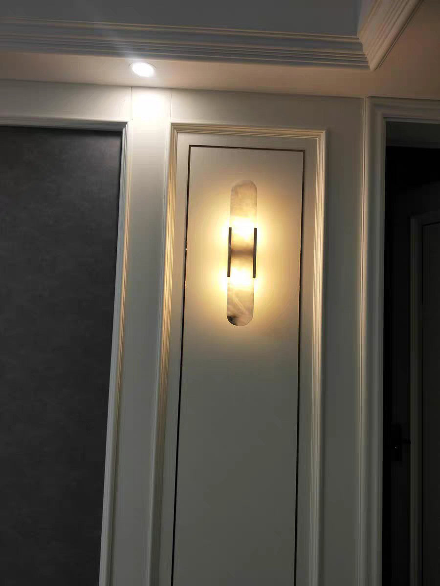Moran - Applique da parete ovale in marmo con lampada LED regolabile