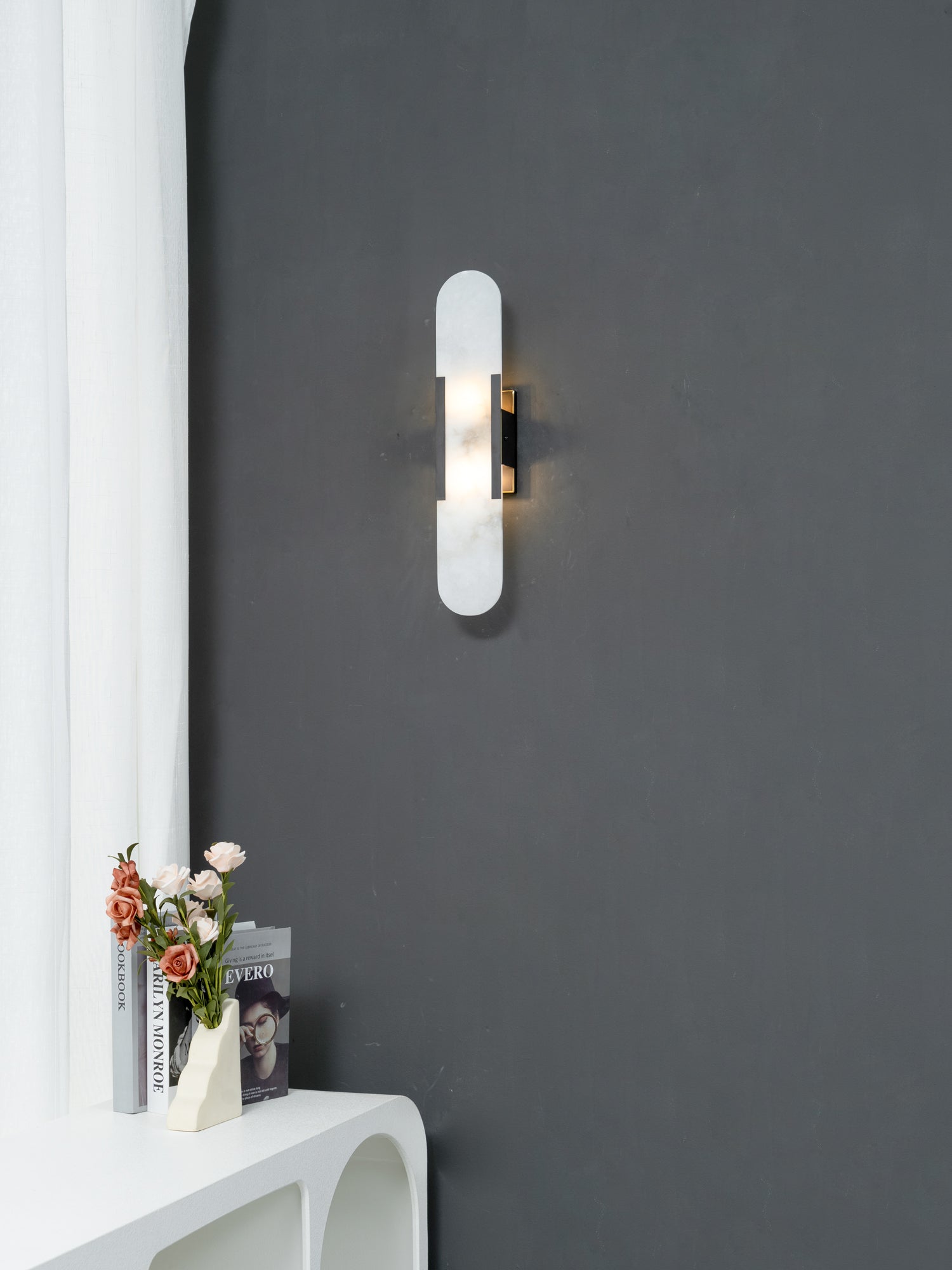 Moran - Applique da parete ovale in marmo con lampada LED regolabile