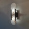 Moran - Applique da parete ovale in marmo con lampada LED regolabile