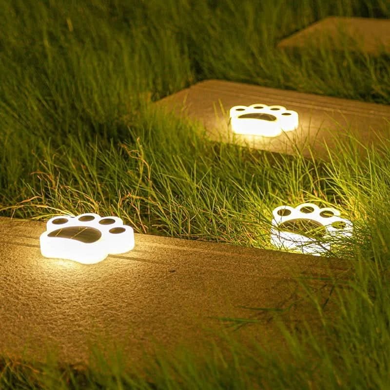 Pawlux – Lampada da pavimento LED solare moderna a forma di zampa  