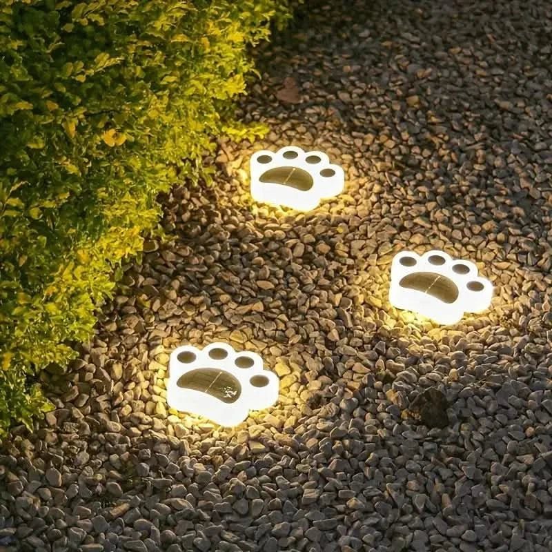 Pawlux – Luz LED solar moderna para suelo con forma de pata  