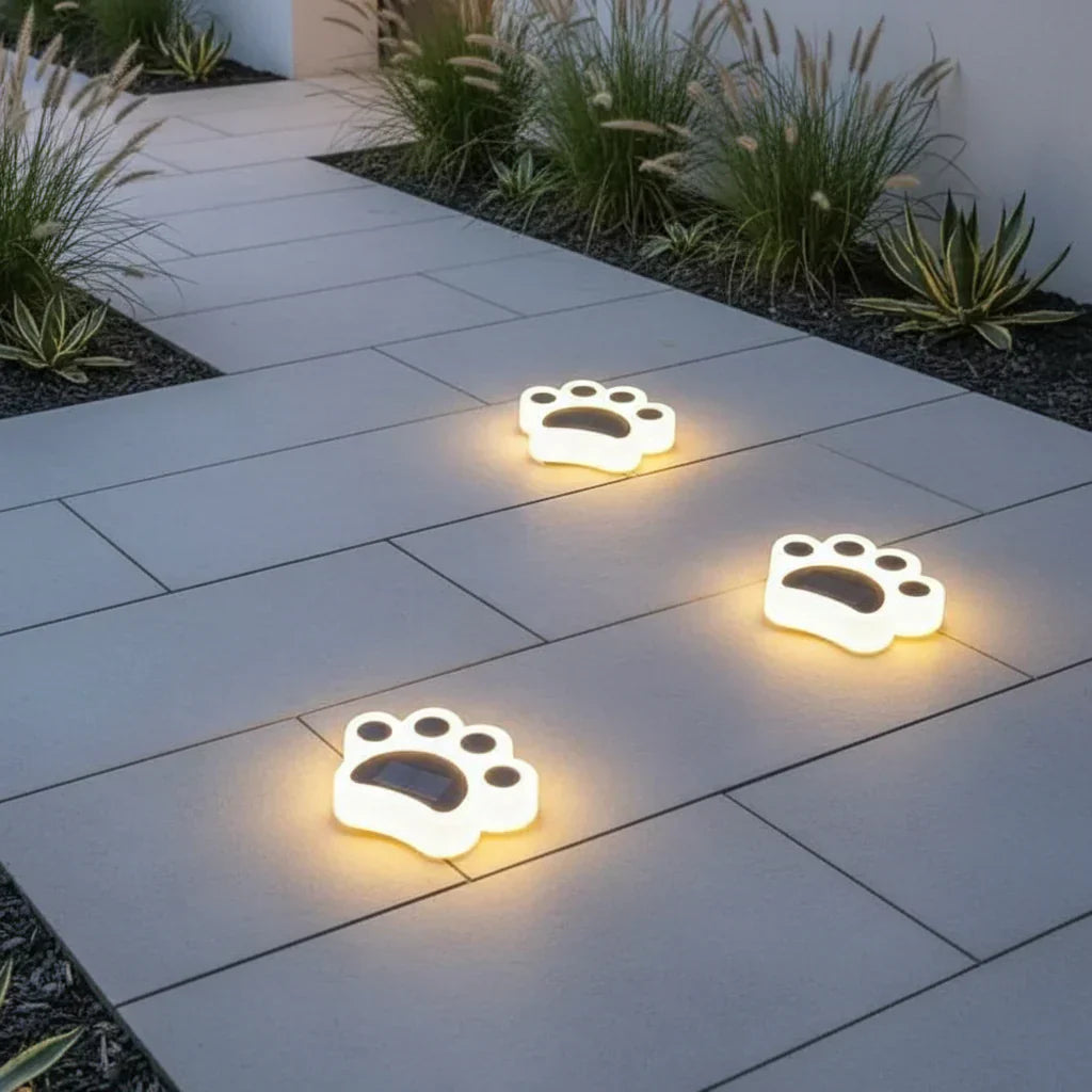 Pawlux – Lampada da pavimento LED solare moderna a forma di zampa  