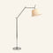 Architectural floor lamp with adjustable arm and fabric shade